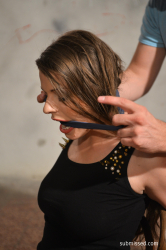 Monalee-chairtied-cleavegagged-titgrabbed