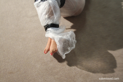 Kayla-Bound-Gagged-And-Wrapped-In-Plastic