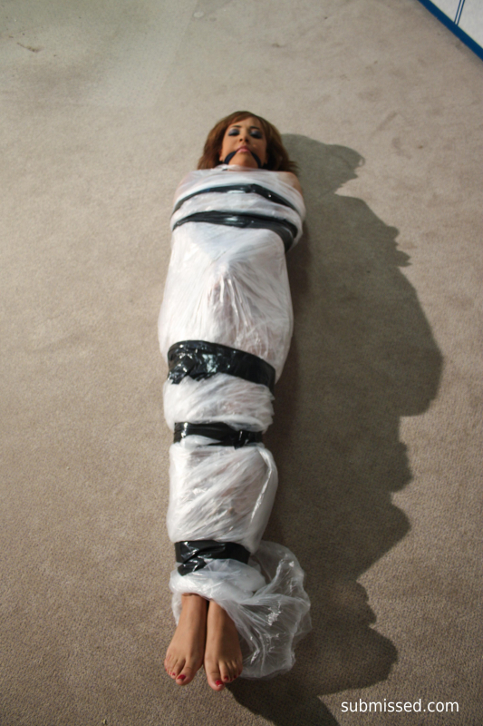 Kayla Bound Gagged And Wrapped In Plastic