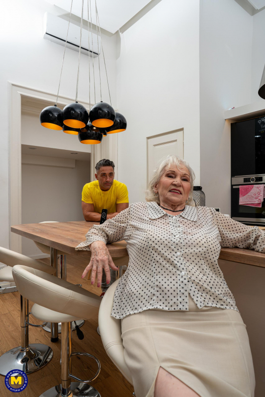 Granny washing up her younger friend