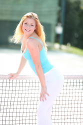 Busty-redhead-on-the-tennis-court