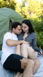 Remido-spills-out-her-big-titties-camping