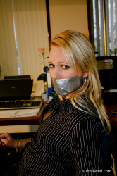 Secretary-Tied-To-Chair-Tapegagged