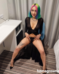 Pierced rainbow haired babe fucking