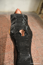 Monalee-wrapped-in-plastic-mouthstuffed-tapegagged
