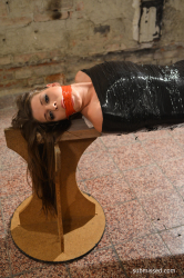 Monalee-wrapped-in-plastic-mouthstuffed-tapegagged
