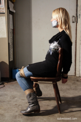 Dutch-Girl-Chairtied-Mouth-Taped-Struggling