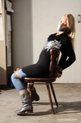 Dutch-Girl-Chairtied-Mouth-Taped-Struggling