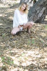 Blonde-angel-touches-herself-in-the-forest