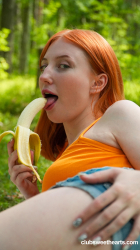 Redhead-Emma-rubs-in-nature