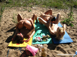 Sweet-lesbians-making-out-on-the-beach