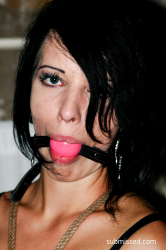 Lucy-on-a-string-bound-up-tight-ballgagged