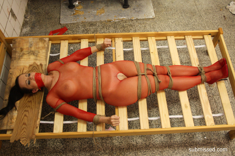 Cindy in the butchery bound to the bed