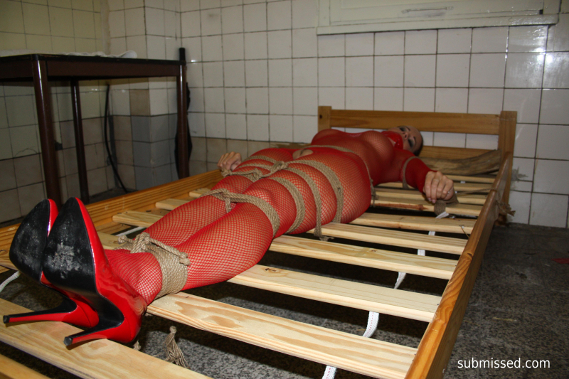 Cindy in the butchery bound to the bed